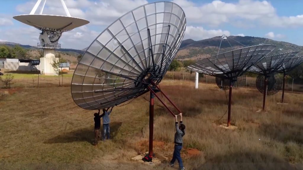 man pulling up satelit drone footage video